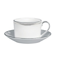 A beautiful collection for formal dining in white fine bone china with delicate platinum-hued rim accents. A beautiful collection for formal dining in white fine bone china with delicate platinum-hued rim accents.