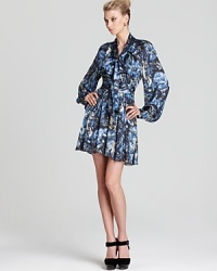 Rachel Zoe takes an artistic approach to dressing with this painterly printed dress, accented with bishop sleeves for added character. Rachel Zoe takes an artistic approach to dressing with this painterly printed dress, accented with bishop sleeves for added character.