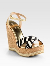 Textured rope trims this powerful cork wedge design, pairing zebra-print pony hair with luminous metallic leather. Cork wedge with rope trim, 5¼ (130mm)Cork platform with rope trim, 1½ (40mm)Compares to a 3¾ heel (95mm)Pony hair and metallic leather upperAdjustable metallic leather ankle strapMetallic leather liningRubber solePadded insoleMade in Spain Textured rope trims this powerful cork wedge design, pairing zebra-print pony hair with luminous metallic leather. Cork wedge with rope trim, 5¼ (130mm)Cork platform with rope trim, 1½ (40mm)Compares to a 3¾ heel (95mm)Pony hair and metallic leather upperAdjustable metallic leather ankle strapMetallic leather liningRubber solePadded insoleMade in Spain