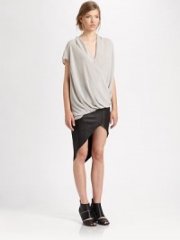 Contrasting panels and an asymmetrical hem enhance this leather traffic stopper. Asymmetrical hemExposed back zipperAbout 29 long at longest pointLeatherDry cleanImported of Italian fabricModel shown is 5'10 (177cm) wearing US size 2. Contrasting panels and an asymmetrical hem enhance this leather traffic stopper. Asymmetrical hemExposed back zipperAbout 29 long at longest pointLeatherDry cleanImported of Italian fabricModel shown is 5'10 (177cm) wearing US size 2.