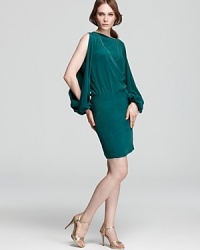 In a rich jewel-tone hue, Nicole Miller's modern split-sleeve dress feels of-the-moment with raglan sleeves and a blouson silhouette. In a rich jewel-tone hue, Nicole Miller's modern split-sleeve dress feels of-the-moment with raglan sleeves and a blouson silhouette.