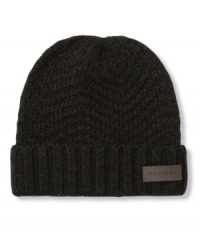 Tommy Hilfiger updates the classic watch cap with this season's herringbone pattern and deep double-ribbed cuff. Tommy Hilfiger updates the classic watch cap with this season's herringbone pattern and deep double-ribbed cuff.