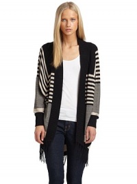 THE LOOKAllover stripe printRibbed knit collarDolman sleevesOpen frontFringe detail at hemTHE FITAbout 32 from shoulder to hemTHE MATERIAL35% cotton/27% viscose/26% nylon/7% angora/5% cashmereCARE & ORIGINDry cleanImportedModel shown is 5'10 (177cm) wearing US size Small. THE LOOKAllover stripe printRibbed knit collarDolman sleevesOpen frontFringe detail at hemTHE FITAbout 32 from shoulder to hemTHE MATERIAL35% cotton/27% viscose/26% nylon/7% angora/5% cashmereCARE & ORIGINDry cleanImportedModel shown is 5'10 (177cm) wearing US size Small.