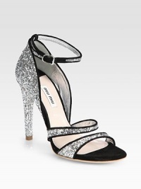 Glitter and suede style with an adjustable ankle strap. Glitter heel, 4 (100mm)Glitter and suede upperLeather and suede liningLeather solePadded insoleMade in Italy Glitter and suede style with an adjustable ankle strap. Glitter heel, 4 (100mm)Glitter and suede upperLeather and suede liningLeather solePadded insoleMade in Italy