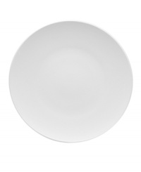 With subtle concentric rings and a sleek shape in durable porcelain, Rosenthal's Loft service plates bring chic versatility to modern tables.