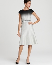 A gradual fade from black to white lends a trend-right look to a sheath dress from Anne Klein. A gradual fade from black to white lends a trend-right look to a sheath dress from Anne Klein.
