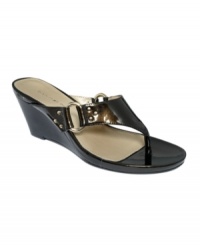 Sophistication with the right amount of shine. Bandolino's Garbine wedge sandals get an added does of shine thanks to the cool metallic rings on the sides. Sophistication with the right amount of shine. Bandolino's Garbine wedge sandals get an added does of shine thanks to the cool metallic rings on the sides.