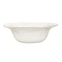 This Vietri bowl was crafted by hand in Tuscany of durable, textural terra cotta for an irresistibly warm appeal. Ornament rolls are used to create its ornate designs. This Vietri bowl was crafted by hand in Tuscany of durable, textural terra cotta for an irresistibly warm appeal. Ornament rolls are used to create its ornate designs.