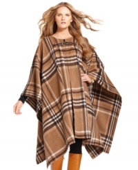 A statement-making topper gives any outfit -- from jeans to a pencil skirt and heels -- added drama! MICHAEL Michael Kors' sweeping poncho features a classic plaid pattern for an elegant look.