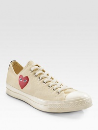 An eye-catching heart peers out from the side of these canvas classics, finished with a contrast stripe at the heel. Rubber toe Lace-up front Painted heart on side Back stripe Padded insole Rubber sole ImportedOUR FIT MODEL RECOMMENDS ordering true whole size; ½ sizes should order the next whole size down. An eye-catching heart peers out from the side of these canvas classics, finished with a contrast stripe at the heel. Rubber toe Lace-up front Painted heart on side Back stripe Padded insole Rubber sole ImportedOUR FIT MODEL RECOMMENDS ordering true whole size; ½ sizes should order the next whole size down.