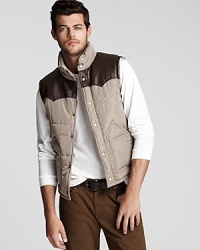 A unique vest with Western-style contrast yokes on the front and back invigorates your look with designer flair. A modern twist on outerwear from True Religion. A unique vest with Western-style contrast yokes on the front and back invigorates your look with designer flair. A modern twist on outerwear from True Religion.