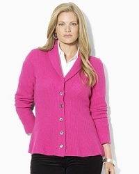 A soft knit cardigan is crafted with a heritage shawl collar and elegant peplum hem for feminine style. A soft knit cardigan is crafted with a heritage shawl collar and elegant peplum hem for feminine style.