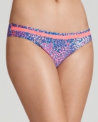 Vamp it up while you bask in this printed bikini from Nanette Lepore. Its playful print and cute cut are sure to make waves whether you're poolside or somewhere tropical. Vamp it up while you bask in this printed bikini from Nanette Lepore. Its playful print and cute cut are sure to make waves whether you're poolside or somewhere tropical.