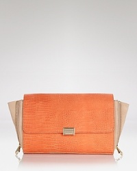 The power clutch is the bag we want now, and this style from Pour La Victoire works the trend with exotic allure, crafted of croc embossed leather. The power clutch is the bag we want now, and this style from Pour La Victoire works the trend with exotic allure, crafted of croc embossed leather.
