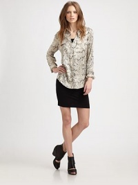 Bold python-print on lustrous satin, tailored in a slim and sleek button-down.Point collarChest pocketsButton-down placketShirttail hemBack box pleatAbout 25 from shoulder to hemSilkDry cleanImportedModel shown is 5'9½ (176cm) wearing US size Small. Bold python-print on lustrous satin, tailored in a slim and sleek button-down.Point collarChest pocketsButton-down placketShirttail hemBack box pleatAbout 25 from shoulder to hemSilkDry cleanImportedModel shown is 5'9½ (176cm) wearing US size Small.