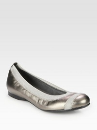 Radiant metallic leather staple held in place by comfortable elastic trim. Metallic nappa leather and elastic upperLeather lining and solePadded insoleImported Radiant metallic leather staple held in place by comfortable elastic trim. Metallic nappa leather and elastic upperLeather lining and solePadded insoleImported
