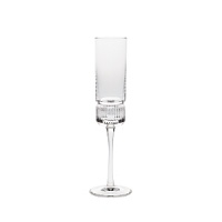 This retro Ralph Lauren flute gleams in hand-blown crystal, accented with sleek, vertical grooves at the base for a deco-inspired look. This retro Ralph Lauren flute gleams in hand-blown crystal, accented with sleek, vertical grooves at the base for a deco-inspired look.