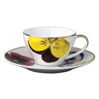 Pensees after dinner saucer by Bernardaud. This lively, luxurious collection is sure to transform your table into a celebration of spring. The floral watercolor pattern features delicate, multicolored pansies that appear to be strewn across the surface of each piece. Pensees after dinner saucer by Bernardaud. This lively, luxurious collection is sure to transform your table into a celebration of spring. The floral watercolor pattern features delicate, multicolored pansies that appear to be strewn across the surface of each piece.