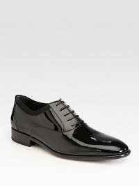The classic lace-up crafted from sleek patent leather and rich grosgrain trim.Patent leather upperLeather liningPadded insoleLeather soleMade in Italy The classic lace-up crafted from sleek patent leather and rich grosgrain trim.Patent leather upperLeather liningPadded insoleLeather soleMade in Italy