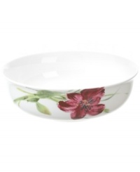 Painterly lilies bloom around this porcelain vegetable bowl, creating a beautiful arrangement with the rest of Oleg Cassini's Sweet Blossom dinnerware. Painterly lilies bloom around this porcelain vegetable bowl, creating a beautiful arrangement with the rest of Oleg Cassini's Sweet Blossom dinnerware.