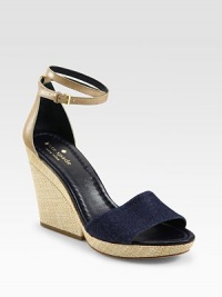 Straw tweed wedge with a comfortable denim and leather upper, finished with an adjustable ankle strap. Straw tweed wedge, 4 (100mm)Denim and leather upperLeather liningBuffed leather solePadded insoleMade in BrazilOUR FIT MODEL RECOMMENDS ordering one half size down as this style runs large. Straw tweed wedge with a comfortable denim and leather upper, finished with an adjustable ankle strap. Straw tweed wedge, 4 (100mm)Denim and leather upperLeather liningBuffed leather solePadded insoleMade in BrazilOUR FIT MODEL RECOMMENDS ordering one half size down as this style runs large.
