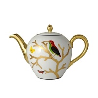 Embellished with a nature-inspired motif and finished in gold, this porcelain teapot from Bernardaud brings an elegantly fanciful look to your table with every pour. Embellished with a nature-inspired motif and finished in gold, this porcelain teapot from Bernardaud brings an elegantly fanciful look to your table with every pour.
