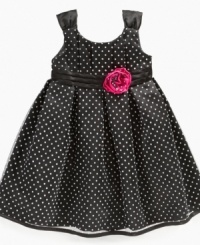 Magnificent dot galore dress by Penelope Mack with bright rosette on satin sash. Magnificent dot galore dress by Penelope Mack with bright rosette on satin sash.