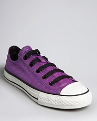 Go glitter with Converses' cute update on their classic sneaker, with the added ease of elastic laces for an easy on and off. Go glitter with Converses' cute update on their classic sneaker, with the added ease of elastic laces for an easy on and off.