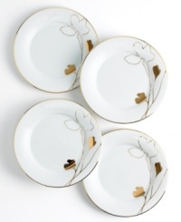 Wildflowers take off on glazed white porcelain, glowing as they tumble aimlessly around these Charter Club appetizer plates. A banded edge adds a classic touch to a pattern with modern spirit. Wildflowers take off on glazed white porcelain, glowing as they tumble aimlessly around these Charter Club appetizer plates. A banded edge adds a classic touch to a pattern with modern spirit.