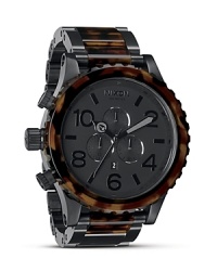 Stealthy and sleek. Nixon's oversized stainless steel watch is a cool choice for those who like to fly under the radar. Slip it on with a trench to be double-oh chic. Stealthy and sleek. Nixon's oversized stainless steel watch is a cool choice for those who like to fly under the radar. Slip it on with a trench to be double-oh chic.