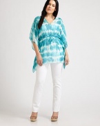 Explore your inner bohemian with this tie-dye tunic featuring flowing, kimono sleeves and a figure-defining, Empire waist. V-neckKimono sleevesDrawstring waistAbout 31 from shoulder to hemPolyesterMachine washImported