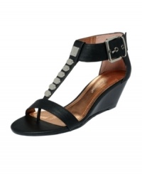 Walk on the edge with the Vella wedge sandals by BCBGeneration. A smoking T-strap features metal studs and the mid-height heel adds a touch of lift to your already sexy look. Walk on the edge with the Vella wedge sandals by BCBGeneration. A smoking T-strap features metal studs and the mid-height heel adds a touch of lift to your already sexy look.
