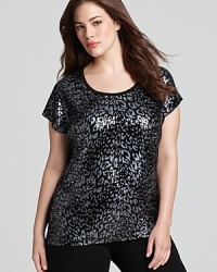 A hard hit of shine enlivens an animal-print MICHAEL Michael Kors Plus top for a roaring fashion statement. Teamed with luxe leather leggings, the style goes from feline to fierce. A hard hit of shine enlivens an animal-print MICHAEL Michael Kors Plus top for a roaring fashion statement. Teamed with luxe leather leggings, the style goes from feline to fierce.