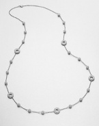 EXCLUSIVELY AT SAKS. A long and elegant style with sparkling, crystal accented ball and circle stations on a link chain. CrystalsRhodium-plated brassLength, about 36Lobster clasp closureImported 