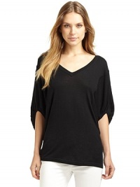 THE LOOKV-neckBanded, elbow length dolman sleeves with ruched detailingPrincess seams, front and backTHE FITAbout 28 from shoulder to hemTHE MATERIAL60% viscose/40% cottonCARE & ORIGINHand washImportedModel shown is 5'9 (175cm) wearing US size Small. THE LOOKV-neckBanded, elbow length dolman sleeves with ruched detailingPrincess seams, front and backTHE FITAbout 28 from shoulder to hemTHE MATERIAL60% viscose/40% cottonCARE & ORIGINHand washImportedModel shown is 5'9 (175cm) wearing US size Small.