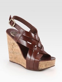 Glimmering leather straps weave across an earthy cork wedge and platform, ending with an adjustable slingback strap. Cork wedge, 5 (125mm)Cork and leather platform, 1½ (40mm)Compares to a 3½ heel (90mm)Leather upperLeather liningRubber soleImportedOUR FIT MODEL RECOMMENDS ordering one half size up as this style runs small. Glimmering leather straps weave across an earthy cork wedge and platform, ending with an adjustable slingback strap. Cork wedge, 5 (125mm)Cork and leather platform, 1½ (40mm)Compares to a 3½ heel (90mm)Leather upperLeather liningRubber soleImportedOUR FIT MODEL RECOMMENDS ordering one half size up as this style runs small.