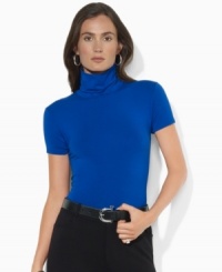 Rendered in sleek jersey, Lauren Ralph Lauren's chic mockneck top is finished with elegant cap sleeves. (Clearance) Rendered in sleek jersey, Lauren Ralph Lauren's chic mockneck top is finished with elegant cap sleeves. (Clearance)
