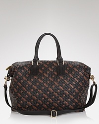 A tried-and-true travel bag with a textured twist. Crafted from woven PVC, this Cornelia Guest bag is ready to carry-it-all. A tried-and-true travel bag with a textured twist. Crafted from woven PVC, this Cornelia Guest bag is ready to carry-it-all.