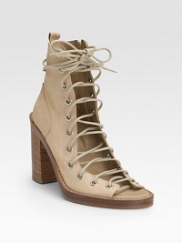 Supple Italian leather is liberated with a laced, open front. Stacked heel, 4 (100mm) Contrast stitching Inside side zip Leather lining and sole Padded insole Made in ItalyOUR FIT MODEL RECOMMENDS ordering one half size up as this style runs small. Supple Italian leather is liberated with a laced, open front. Stacked heel, 4 (100mm) Contrast stitching Inside side zip Leather lining and sole Padded insole Made in ItalyOUR FIT MODEL RECOMMENDS ordering one half size up as this style runs small.