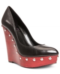 Uniquely studded, the Eliza high wedge pumps will take your look to fierce new levels. Uniquely studded, the Eliza high wedge pumps will take your look to fierce new levels.