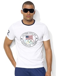 An essential trim-fitting T-shirt is crafted from supremely soft cotton jersey with a bold athletic-inspired graphic, celebrating Team USA's participation in the 2012 Olympic Games. An essential trim-fitting T-shirt is crafted from supremely soft cotton jersey with a bold athletic-inspired graphic, celebrating Team USA's participation in the 2012 Olympic Games.
