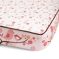 Birds frolic on blooming tree branches while shades of pink and orange highlight the coordinating floral print separated by brown piping. The American Academy of Pediatrics and the U.S. Consumer Product Safety Commission have made recommendations for safe bedding practices for babies. When putting infants under 12 months to sleep, remove pillows, quilts, comforters, and other soft items from the crib. Birds frolic on blooming tree branches while shades of pink and orange highlight the coordinating floral print separated by brown piping. The American Academy of Pediatrics and the U.S. Consumer Product Safety Commission have made recommendations for safe bedding practices for babies. When putting infants under 12 months to sleep, remove pillows, quilts, comforters, and other soft items from the crib.