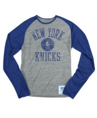 Rush the court! Be a part of the team victory with this New York Knicks NBA raglan shirt from adidas. Rush the court! Be a part of the team victory with this New York Knicks NBA raglan shirt from adidas.