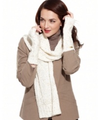 Simply chic, these plush cable knit arm warmers from Calvin Klein feature a fingerless design that makes texting a breeze when you're out and about in chilly weather. Simply chic, these plush cable knit arm warmers from Calvin Klein feature a fingerless design that makes texting a breeze when you're out and about in chilly weather.