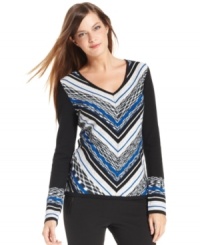 Calvin Klein's latest sweater features a striking chevron stripe and sleek, fitted silhouette. Calvin Klein's latest sweater features a striking chevron stripe and sleek, fitted silhouette.