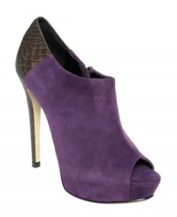 An amazing lizard print-embossed heel puts the Colton booties a cut above the rest. With a covered platform and smooth suede upper, this peep-toe style will be your new trendy favorite. An amazing lizard print-embossed heel puts the Colton booties a cut above the rest. With a covered platform and smooth suede upper, this peep-toe style will be your new trendy favorite.