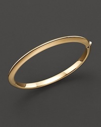 The classic bangle in 18 Kt. gold. Designed by Roberto Coin. The classic bangle in 18 Kt. gold. Designed by Roberto Coin.