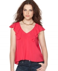 Ruffles make BCBGeneration's top more than a little sultry - pair with jeans and heels for a hot night out! Ruffles make BCBGeneration's top more than a little sultry - pair with jeans and heels for a hot night out!