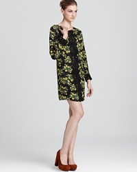 Dramatic lace accents boldly contrast with vivid print in this sumptuous silk Milly shift dress. Dramatic lace accents boldly contrast with vivid print in this sumptuous silk Milly shift dress.