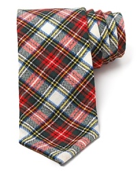Classic tartan plaid defines this rakish tie from Jack Spade, a traditional pattern rendered in a thoroughly modern shape for today's man. Classic tartan plaid defines this rakish tie from Jack Spade, a traditional pattern rendered in a thoroughly modern shape for today's man.